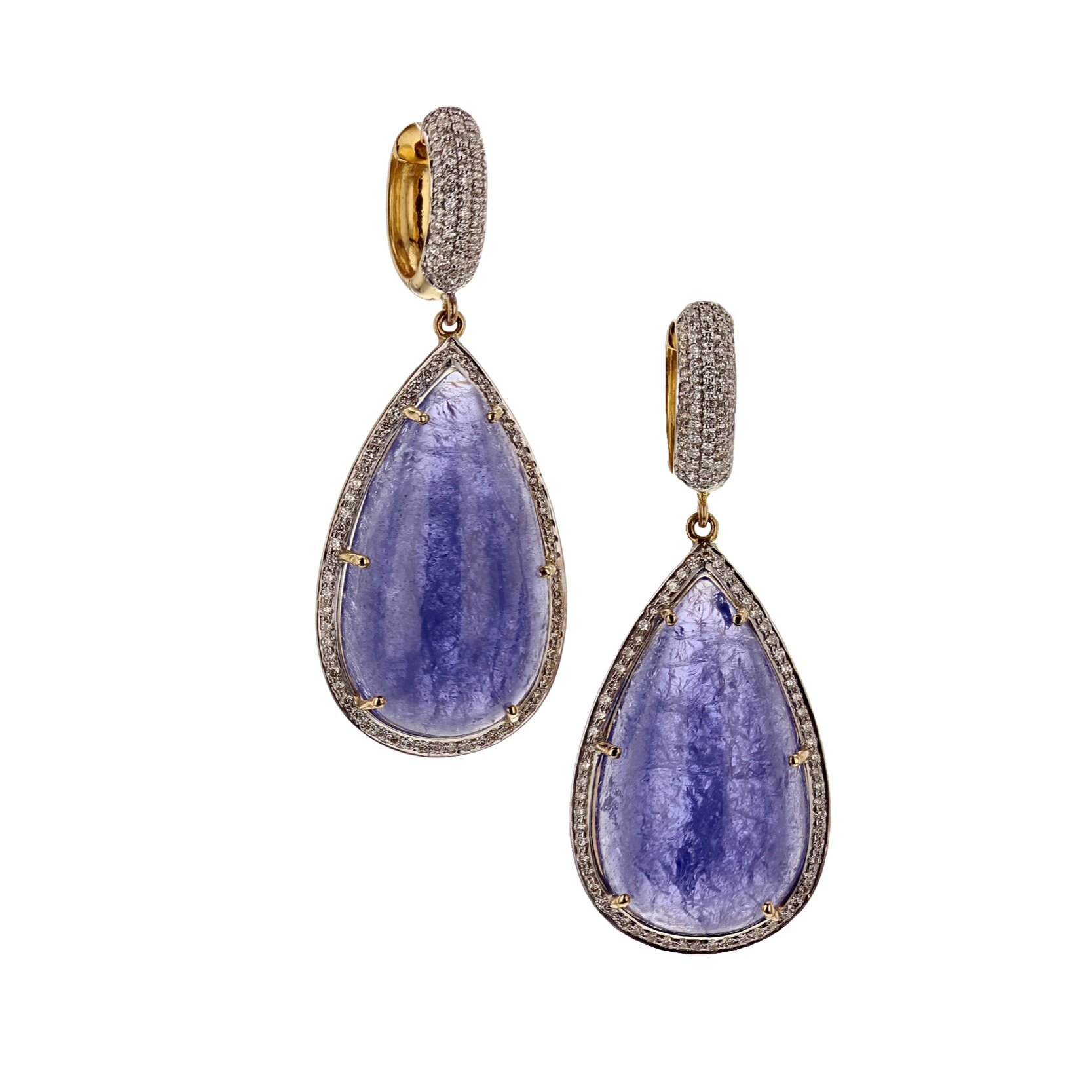 From the Treśor Collection. Tanzanite (45 carats) and Diamond Pavé (1.04 ctw.) 18K gold drop earrings. $5750