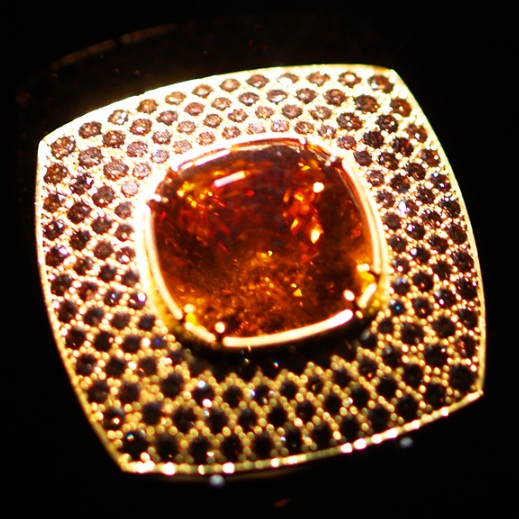 Mandarin Garnet (39.35 carats) and (1.82 carats) of pave cognac diamonds 18k yellow gold diamond ring designed and created by Ernesto Moreira, Houston, Texas, U.S.A.